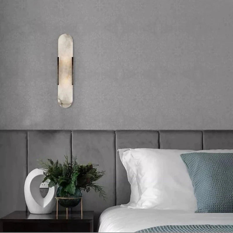 "Elegant black & gold LED wall lamp with sleek metal finish, perfect for modern interiors, offers stylish, warm lighting."