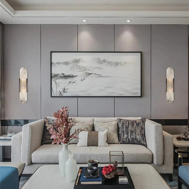 "Elegant black & gold LED wall lamp with sleek metal finish, perfect for modern interiors, offers stylish, warm lighting."
