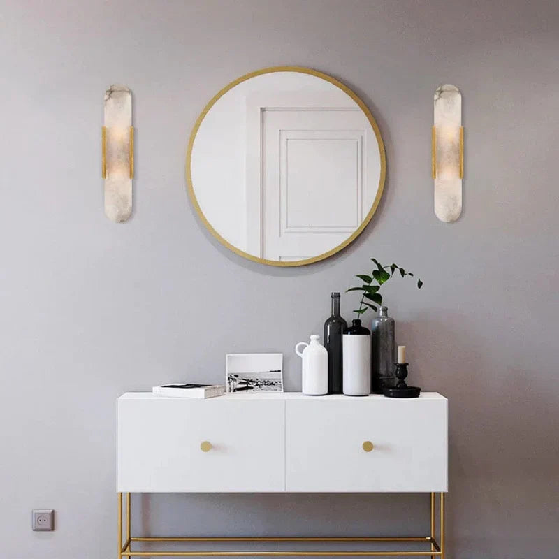 "Elegant black & gold LED wall lamp with sleek metal finish, perfect for modern interiors, offers stylish, warm lighting."