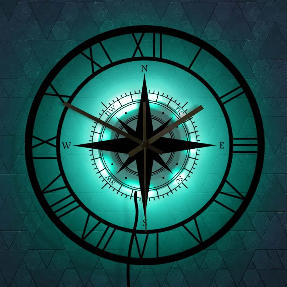 Elegant nautical compass wall clock with vintage design; circular shape with high-quality metal and acrylic finish.
