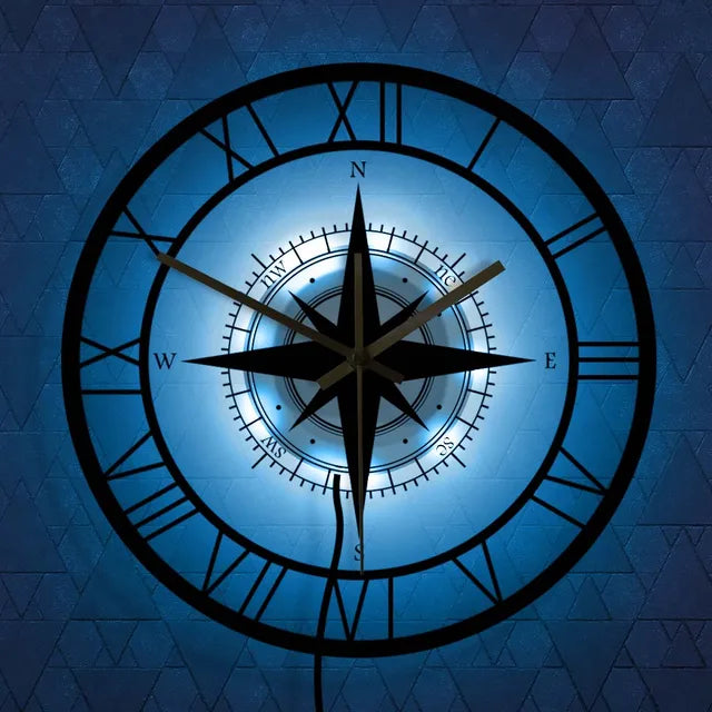 Elegant nautical compass wall clock with vintage design; circular shape with high-quality metal and acrylic finish.