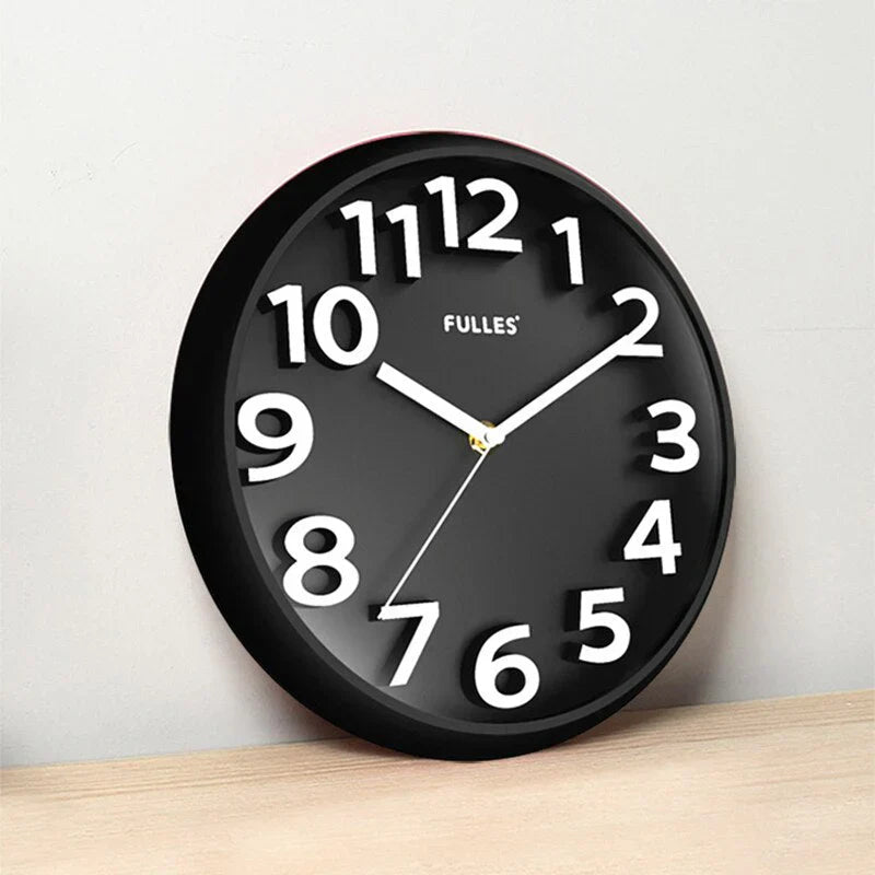 Modern minimalist wall clock with sleek black rim and silent operation, enhancing any room with its sophisticated design.