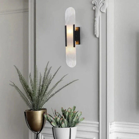 "Elegant black & gold LED wall lamp with sleek metal finish, perfect for modern interiors, offers stylish, warm lighting."