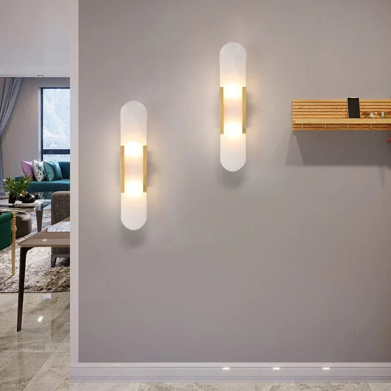 "Elegant black & gold LED wall lamp with sleek metal finish, perfect for modern interiors, offers stylish, warm lighting."