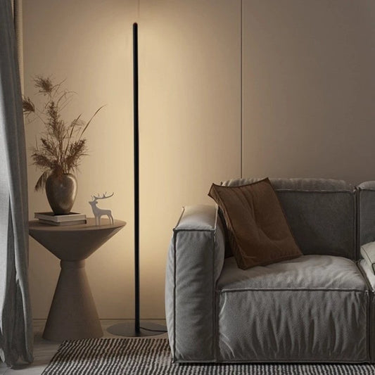 Elegant LED floor lamp with minimalist design, soft ambient lighting, adjustable timer, and remote control for modern interio