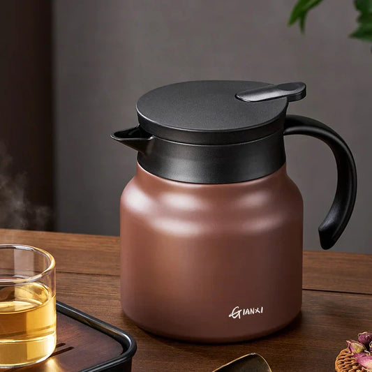 "Sleek insulated teapot with infuser, ceramic steel liners, 800ml capacity, in stylish brown, perfect for hot or cold drinks.